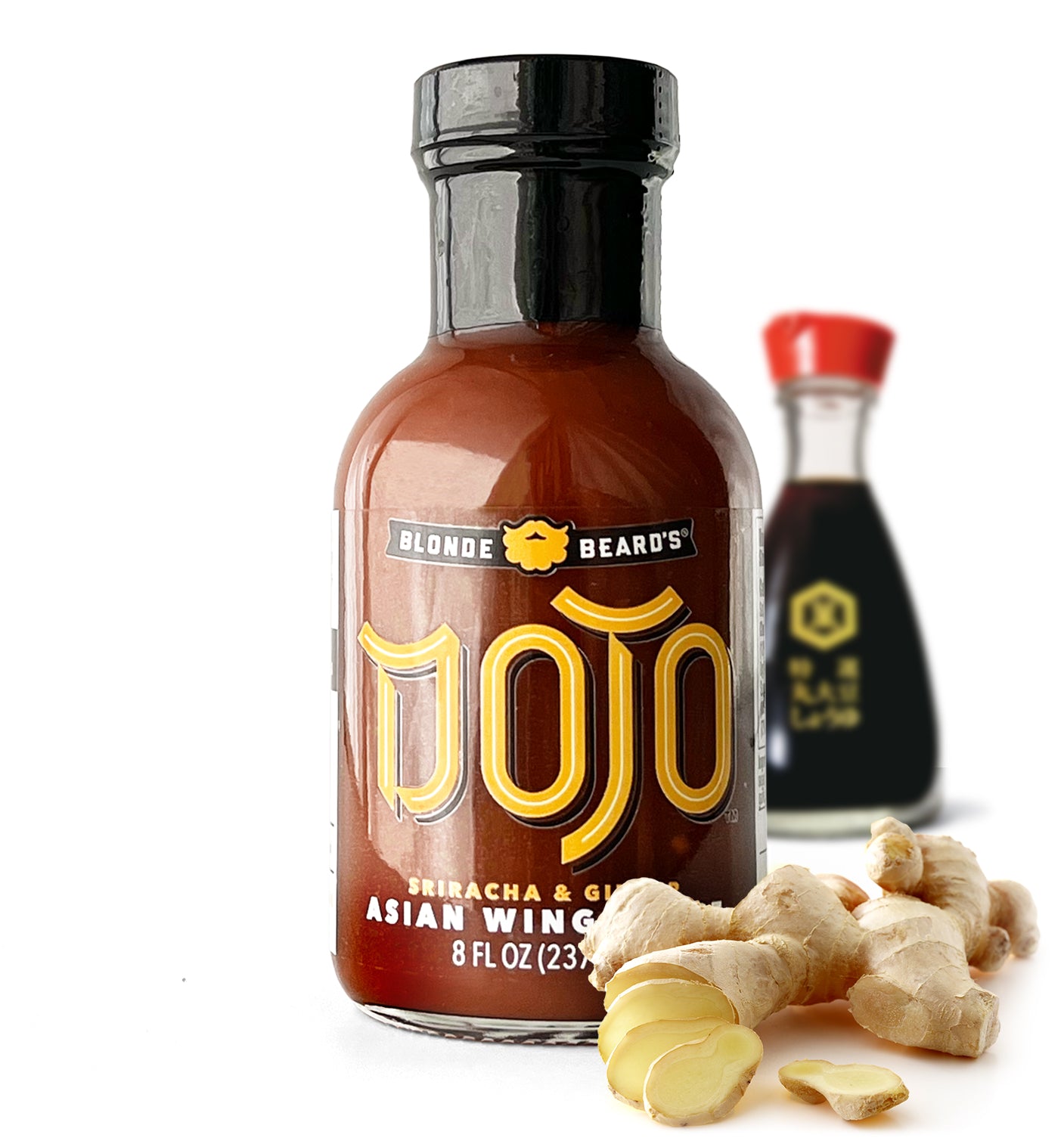 Dojo Asian wing sauce bottle photographed with peppers, ginger, and soy sauce highlighting Asian-inspired flavors.