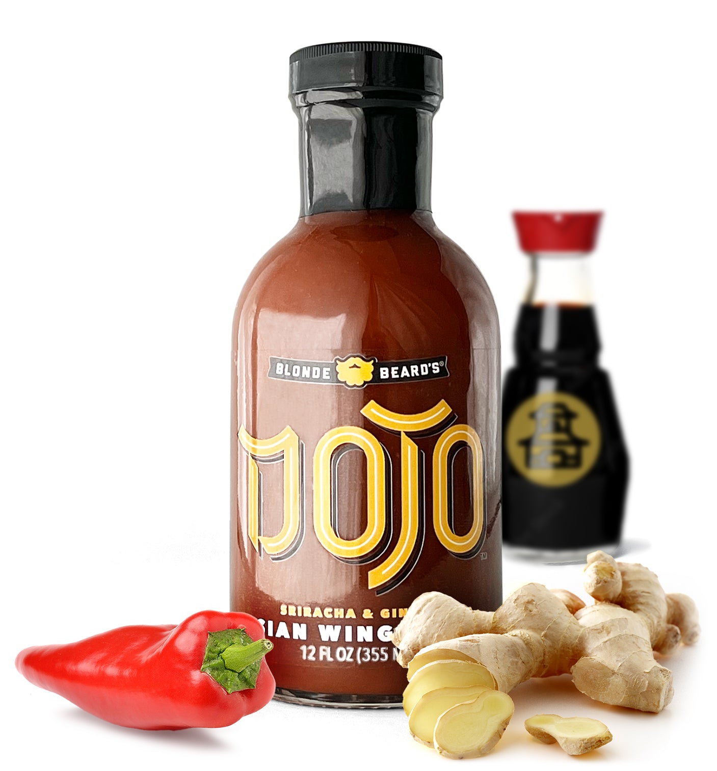 
                  
                    Dojo Asian wing sauce bottle photographed with peppers, ginger, and soy sauce highlighting Asian-inspired flavors.

                  
                