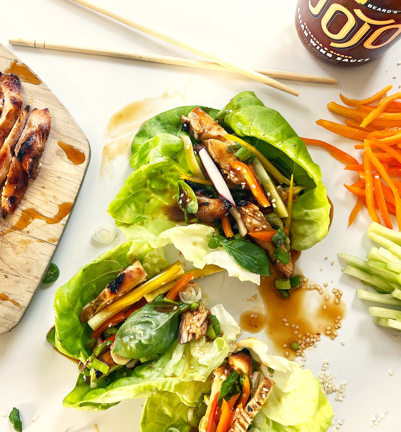 
                  
                    Fresh lettuce wraps filled with chicken and vegetables drizzled with Dojo Asian wing sauce.
                  
                